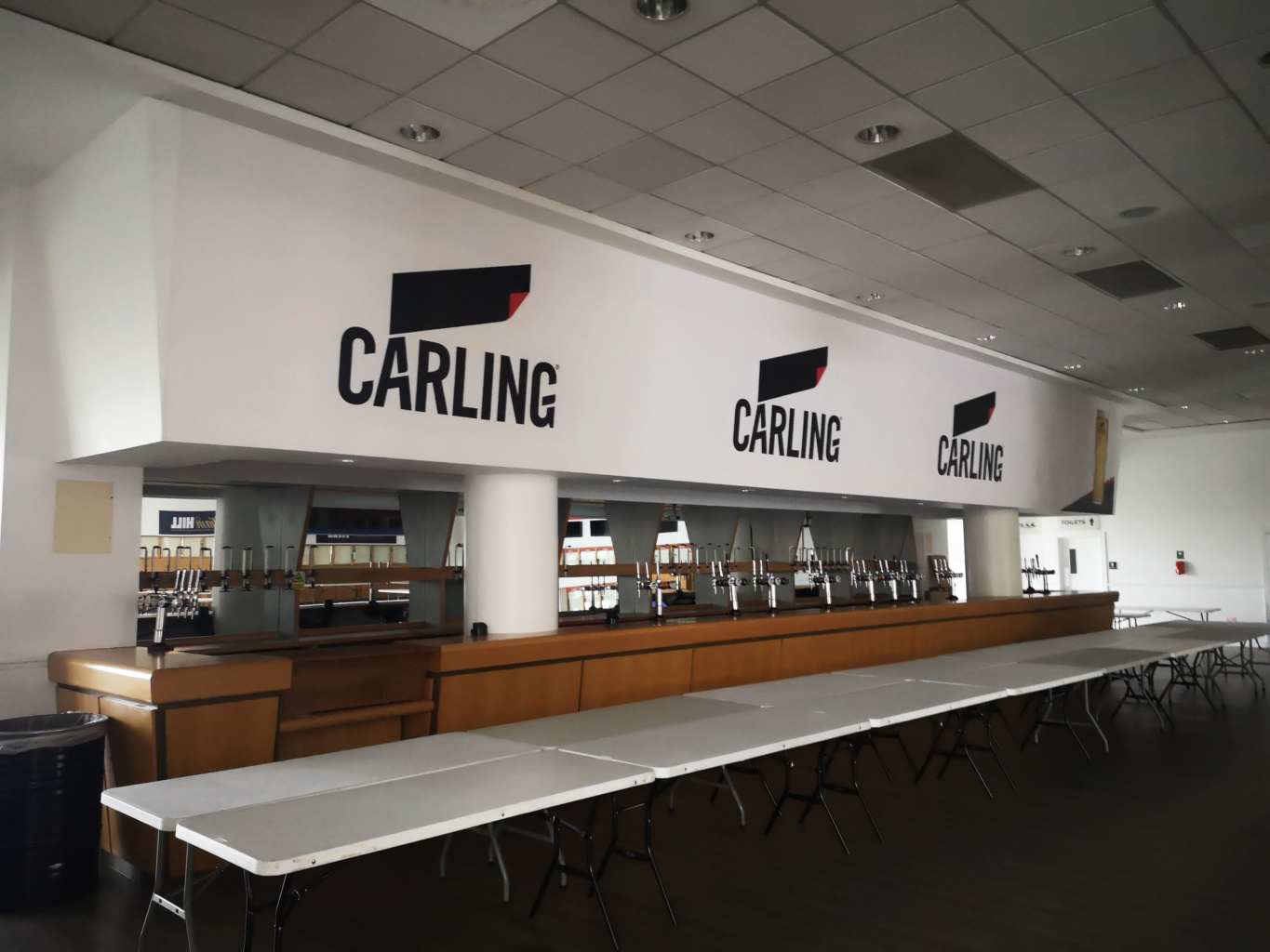 'Before' shot of the Rum and Ginger bar at Aintree with 'Carling' branding only