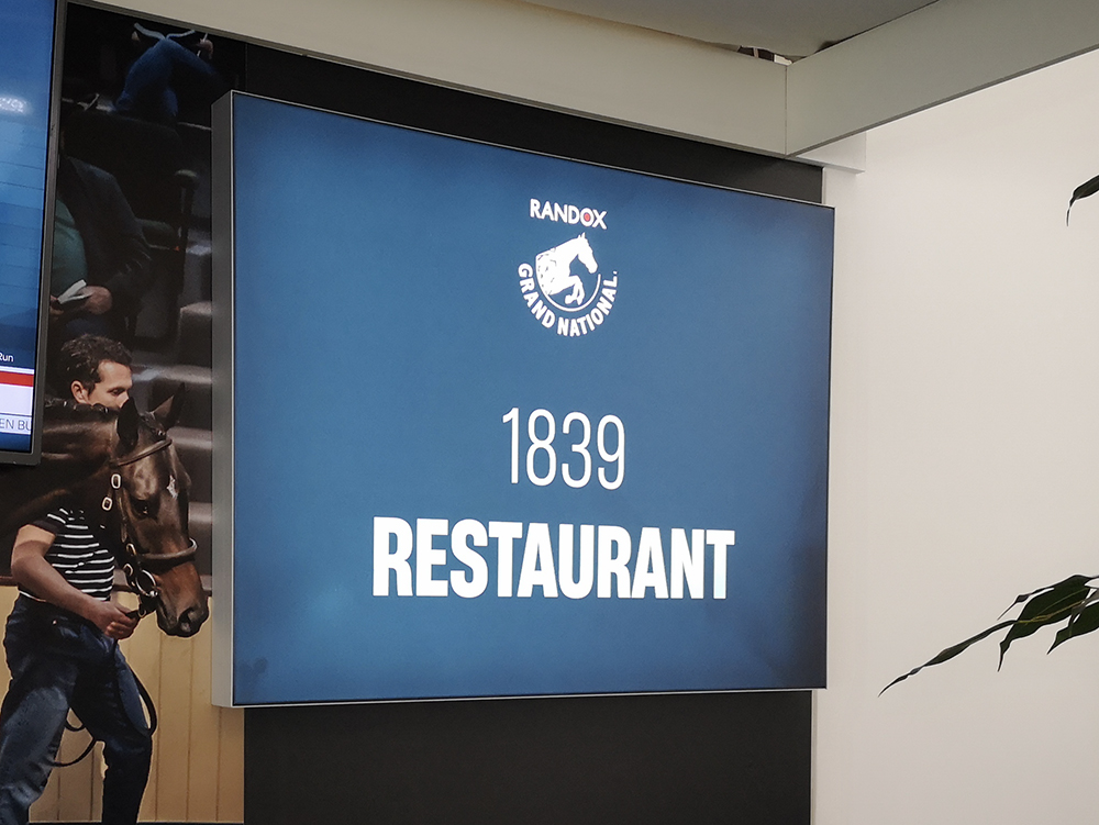 A wall mounted lightbox showing the 1839 Restaurant branding