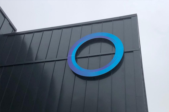 oldham college signage on side of building